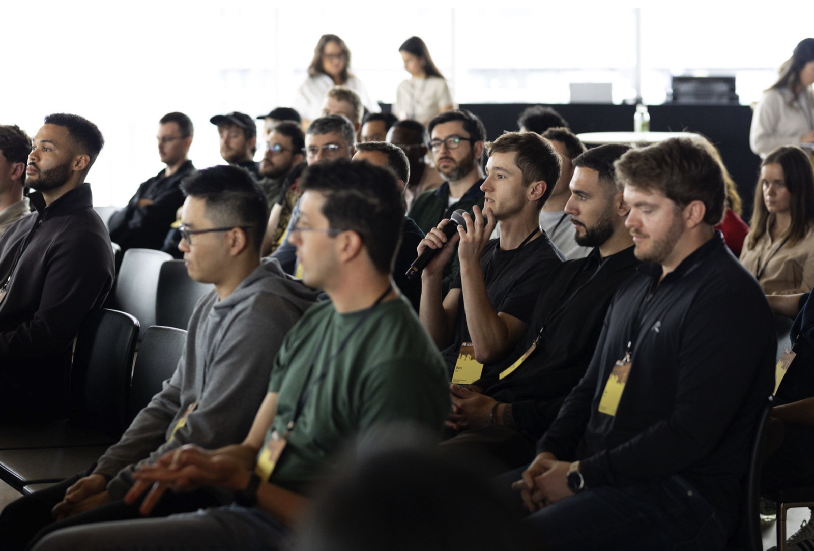 Attendees listening during a session at a previous ACX Retreat